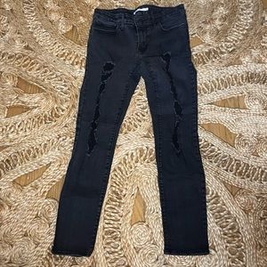 Distressed Levi’s skinny jeans